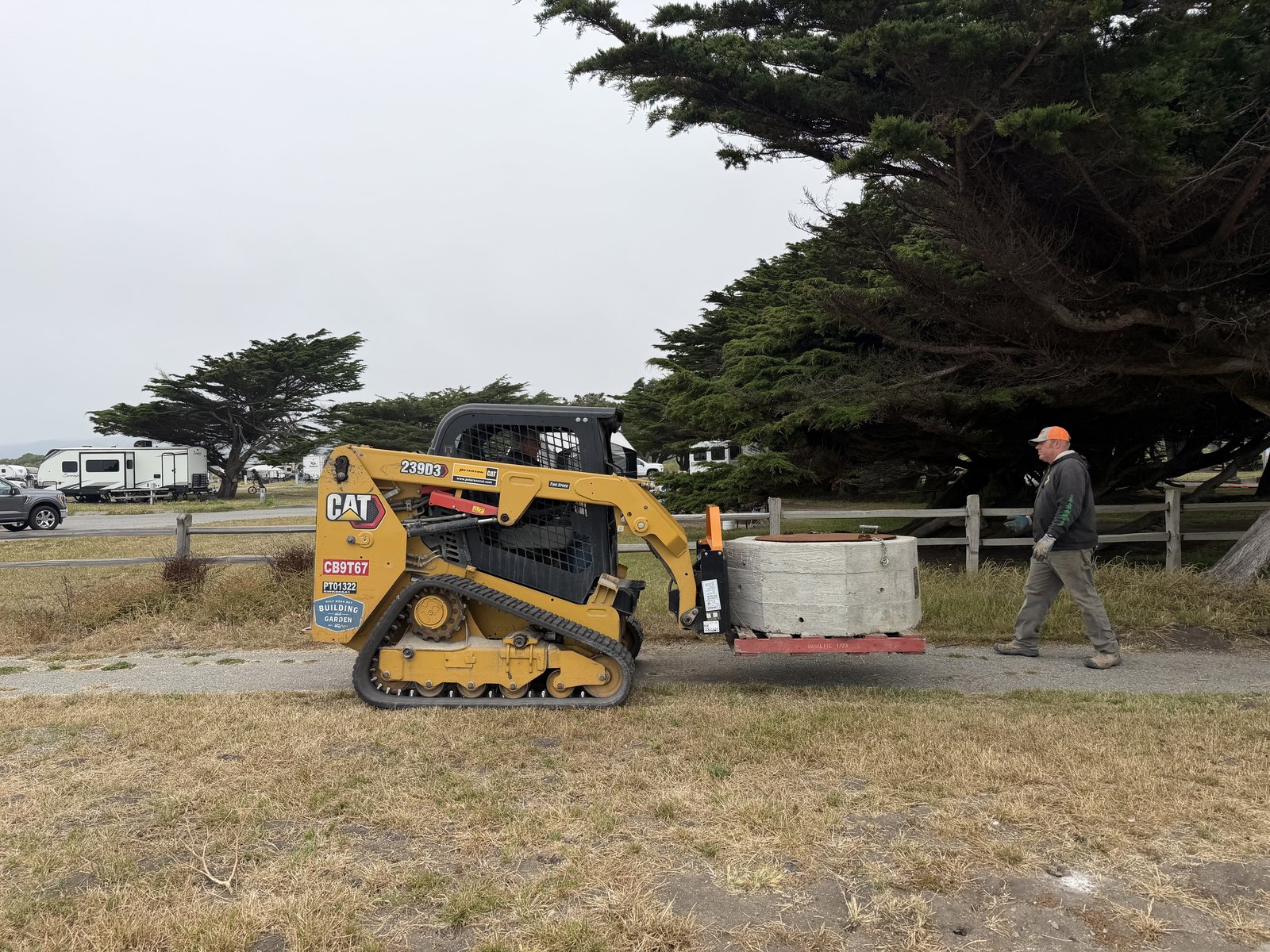 Installing fire pits on Poplar Beach